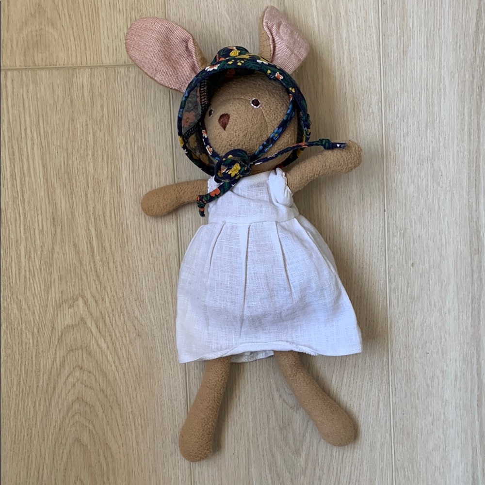 Adorable Brown and White Plush Toy with Pink Ears